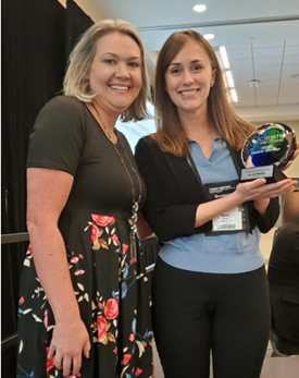 Best Oral Abstract recipient, Sarah Hatley, RN, (right) poses for a photo with Eileen Tuschl, Director of CIBMTR MCW Data Operations (left).