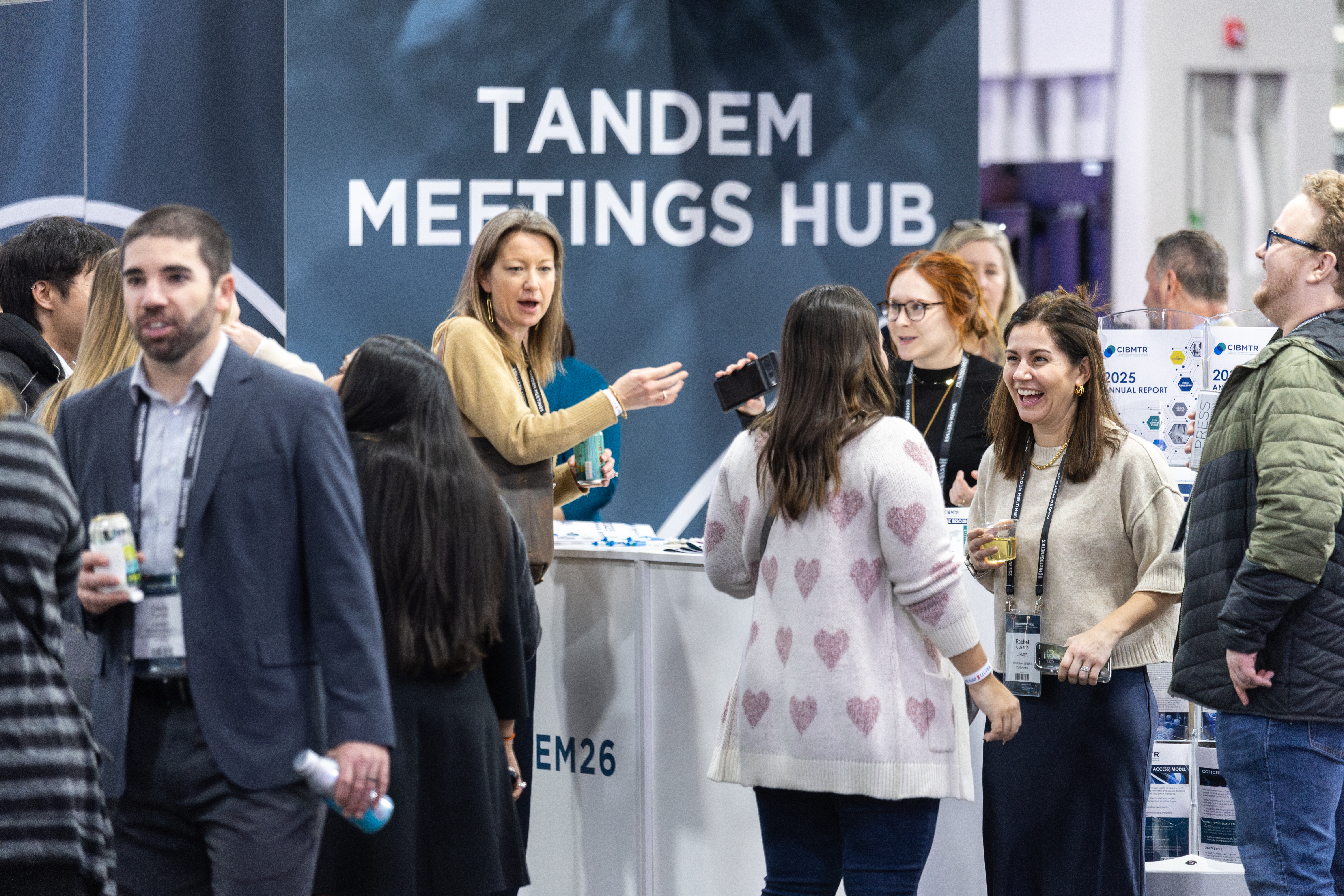 2026 attendees visit the CIBMTR booth.