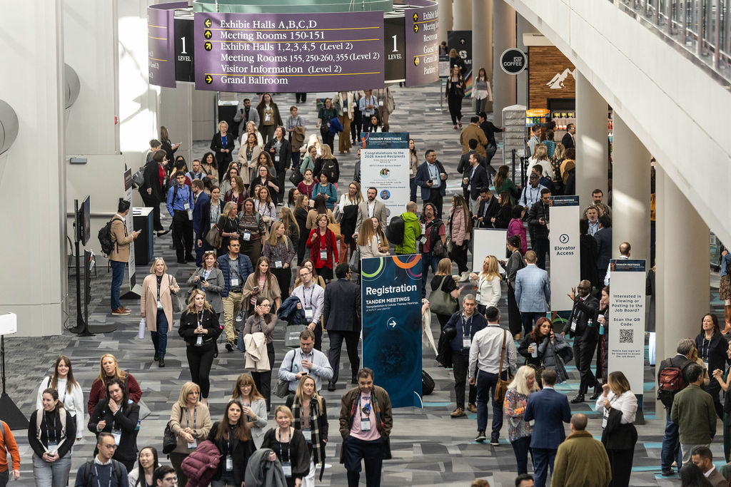 Attendees walk the halls between sessions